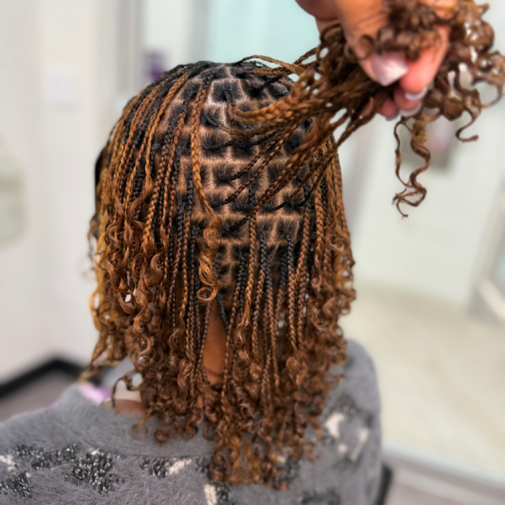 Natural Hair Styles at LuLu's Loc&Braid Bar in Missouri City, TX