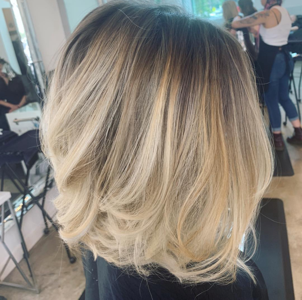 Blowout For Short-medium Hair at Hair Envy in Houston, TX