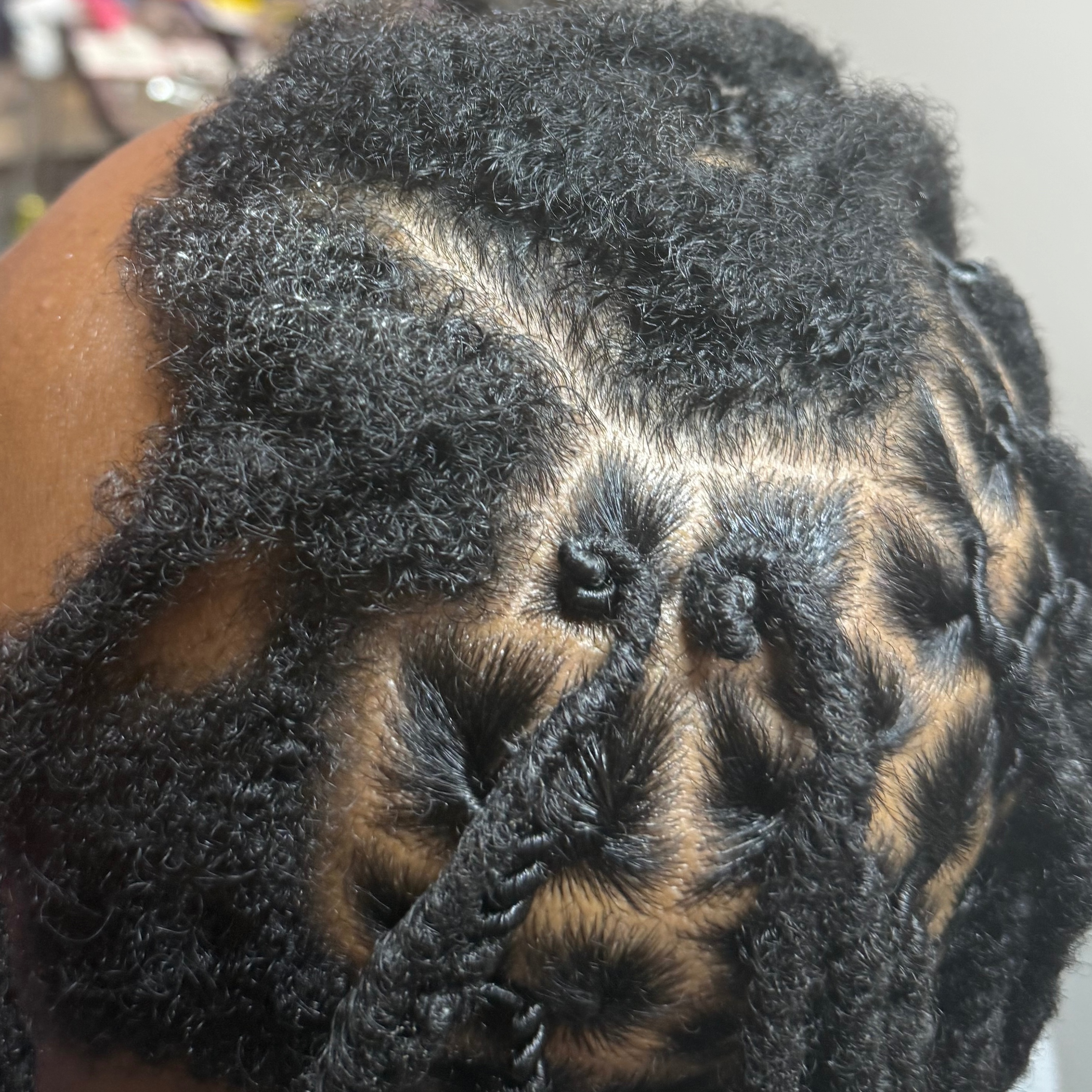 Traditional Loc Maintenance at Mere C Tresses in Chicago, IL