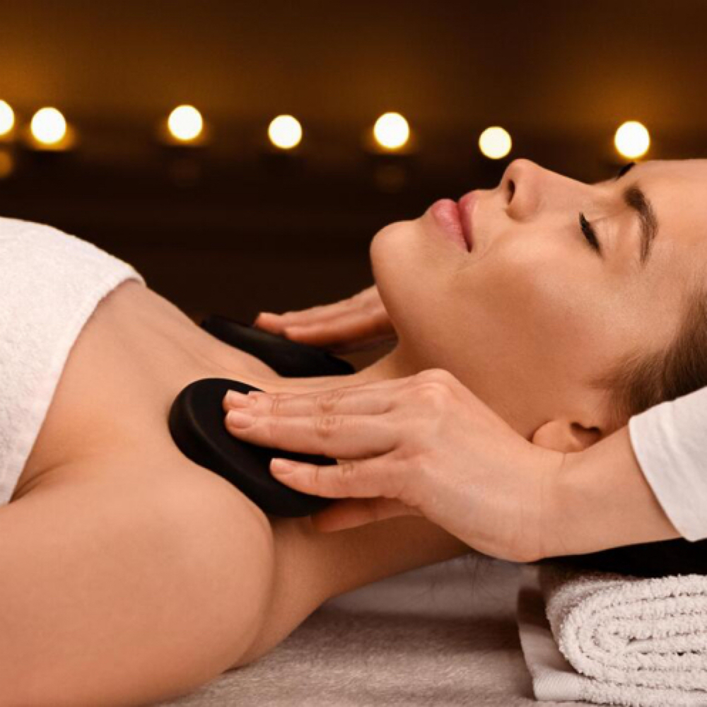 Hot Stone Shoulder Massage at Alchemy Head Spa & Salon in Mount Dora, FL