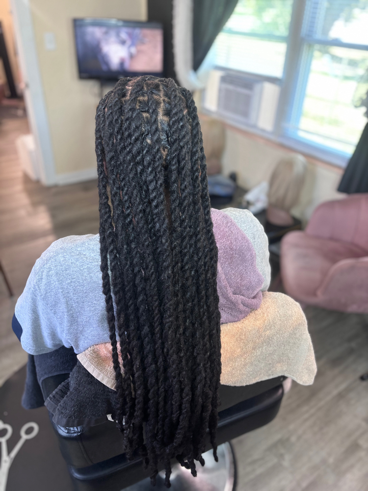 Extra long Loc retwist and style at The Braid Boutique 706 in Augusta Ga, GA
