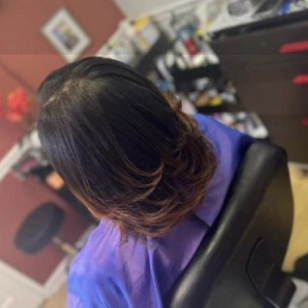 Silk Press/Shampoo Style at Natasha Martin Hair Vision LLC in Greensboro, NC