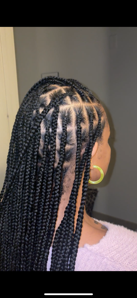 Knotless braids at Veloré Studios & Co in Stone Mountain, GA