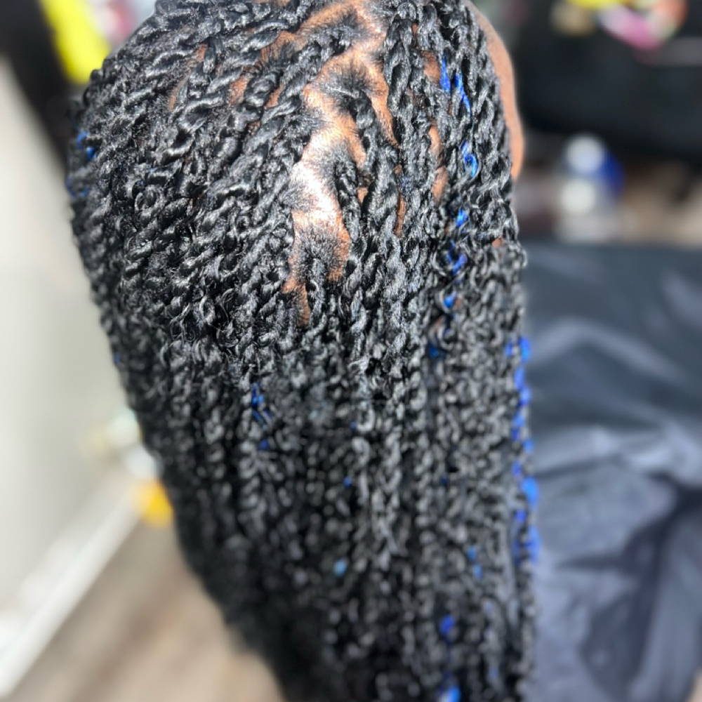 Small BoHo Braids at Cut Up & D.Y. E. Salon and Spa in New Orleans, LA