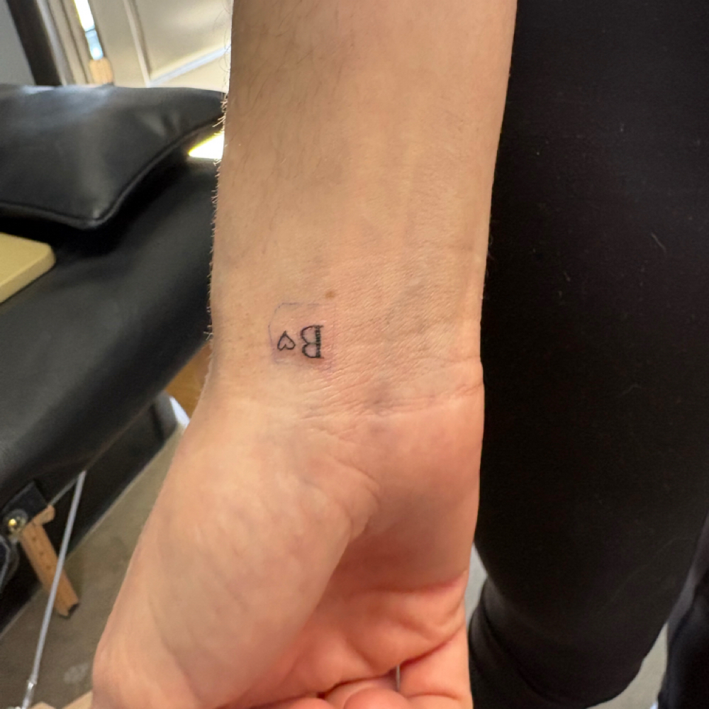 Tiny Tattoo at Golden Tattoo & Piercing in Iowa City, IA