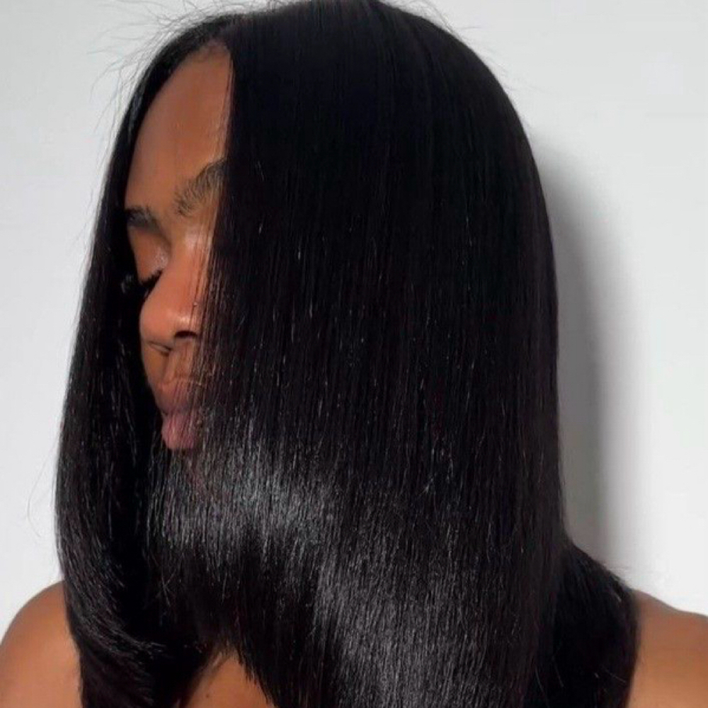 Silk Press + Treatment at Haus Of Kartel in Rochester, NY