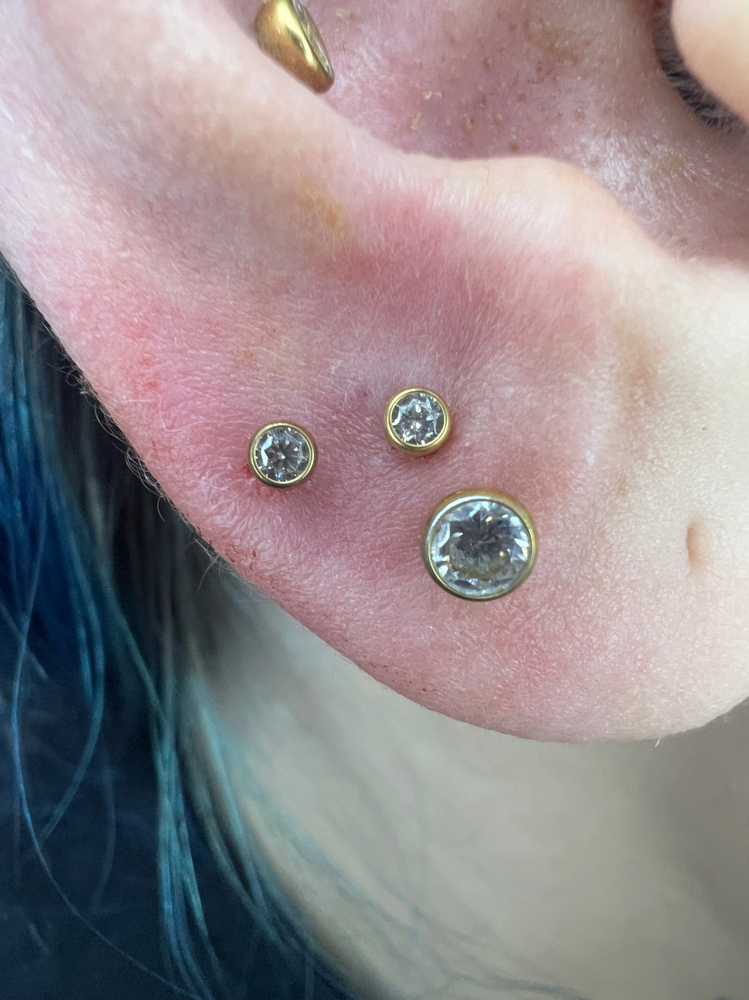 Pair Of Ear Lobe Piercings