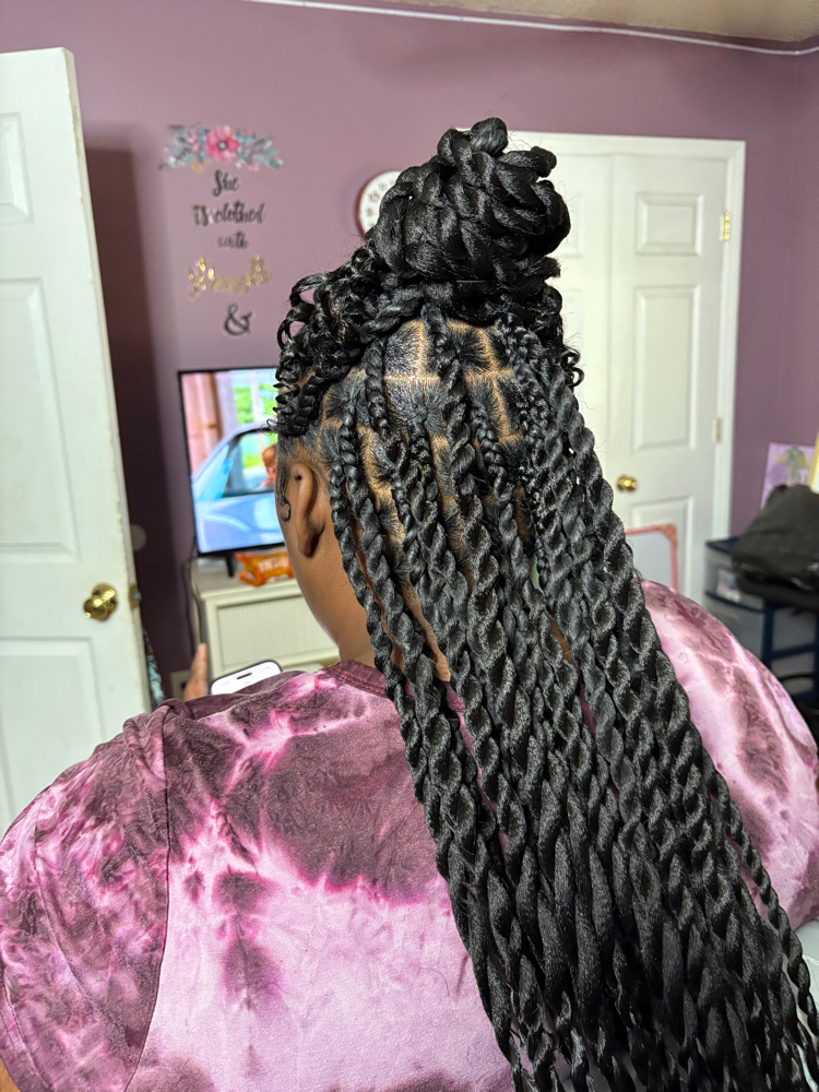 island twists with fulani in front