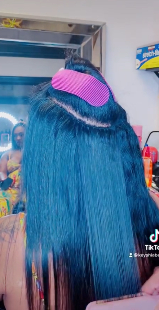 Braidless Sew-in at Silked Artistry in Westland, MI