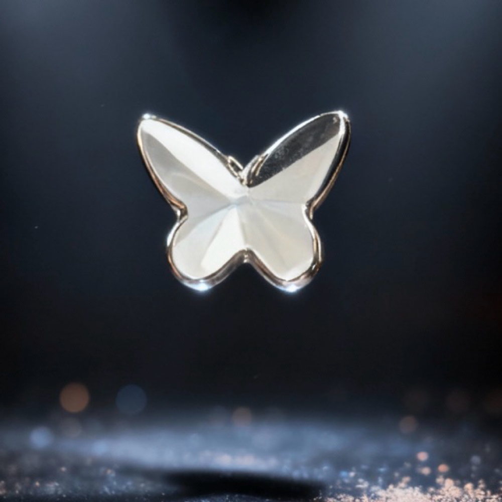Butterfly Shape Tooth Gem at Queen Of The Mouth in San Antonio, TX