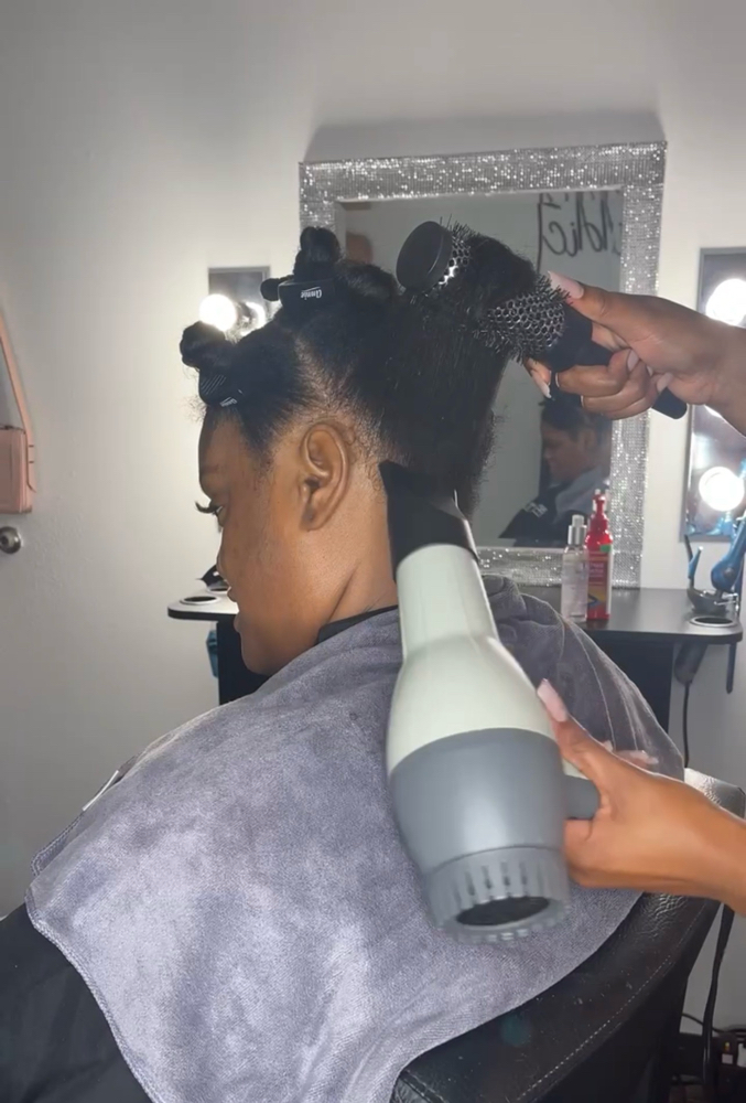 Wash & Blow Dry at The CosmAddict in Arlington, TX