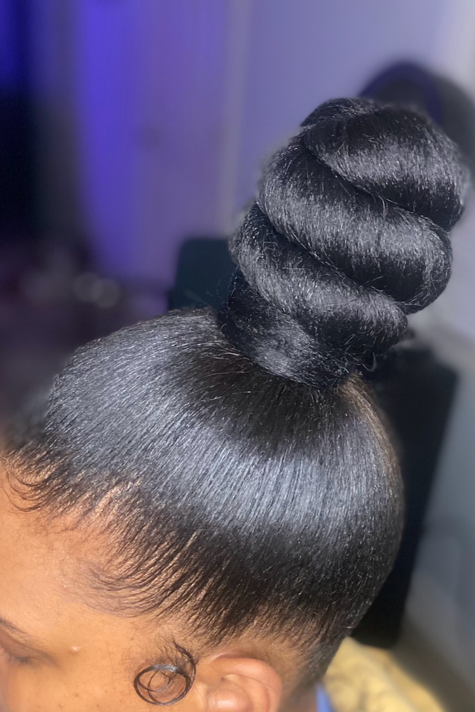 Sleek Ponytail/ Bun at The Beauty Mark in Laurel, MS