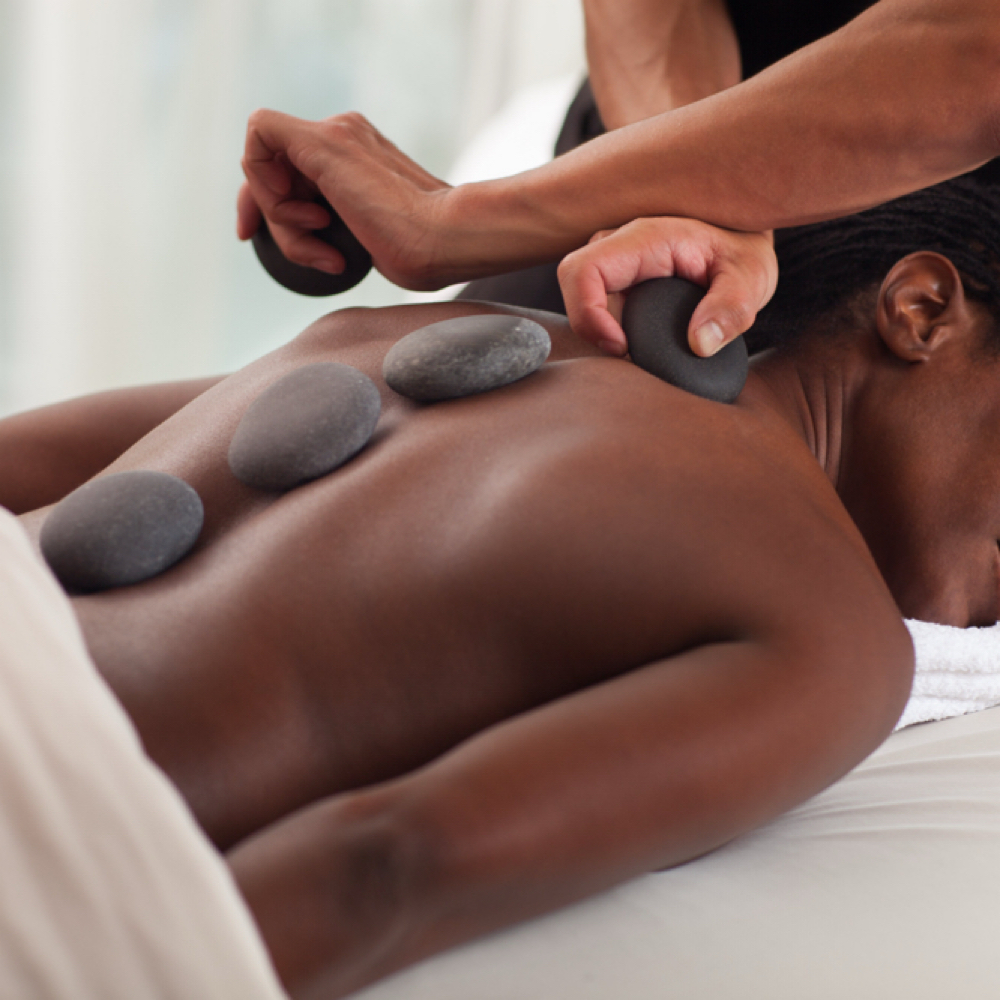 Hot Stone Massage at PureLūXé Beauty & Spa