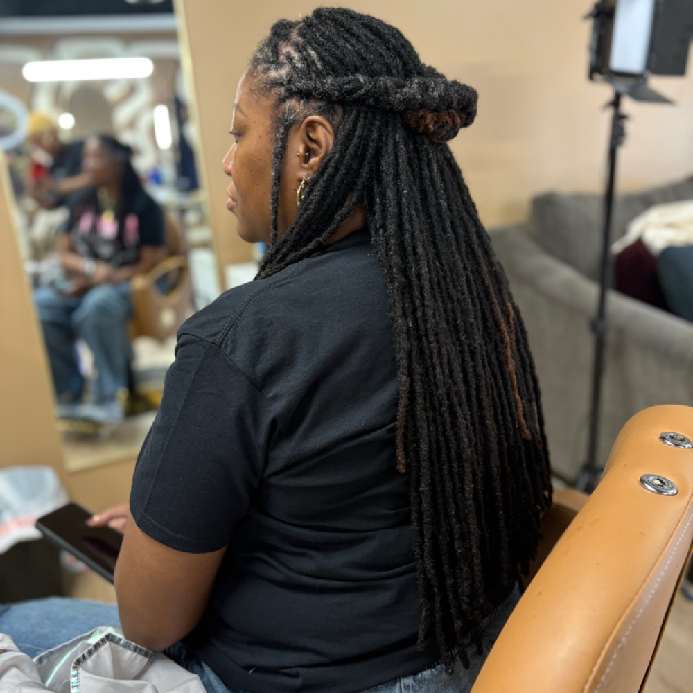 Butt Length Loc Re-twist at The Loc Station LLC in Hopewell, VA