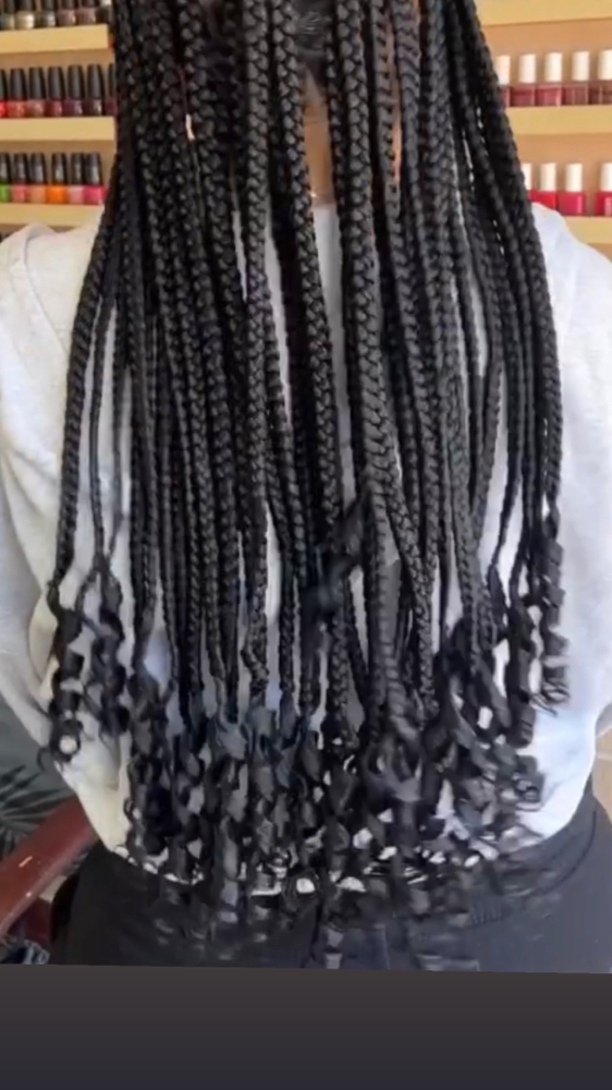 Curls At Bottom Of Braiding Hair