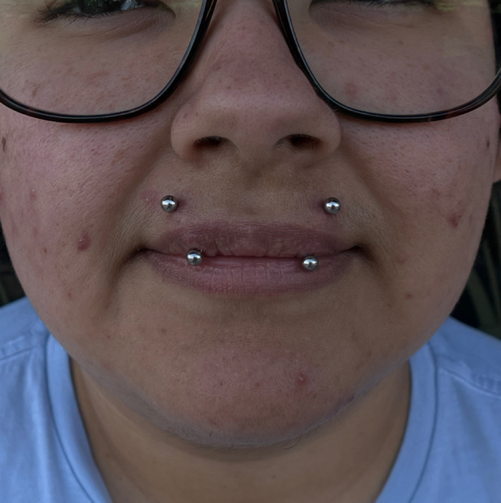 Angel Fangs / bites at Artistry Tattoo & Piercing Parlor in San antonio, TX