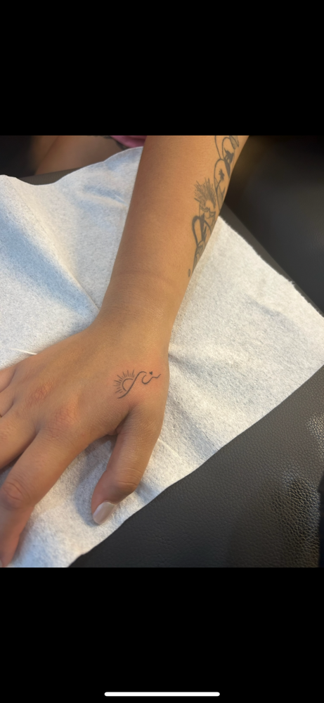Fine Line Tattoo