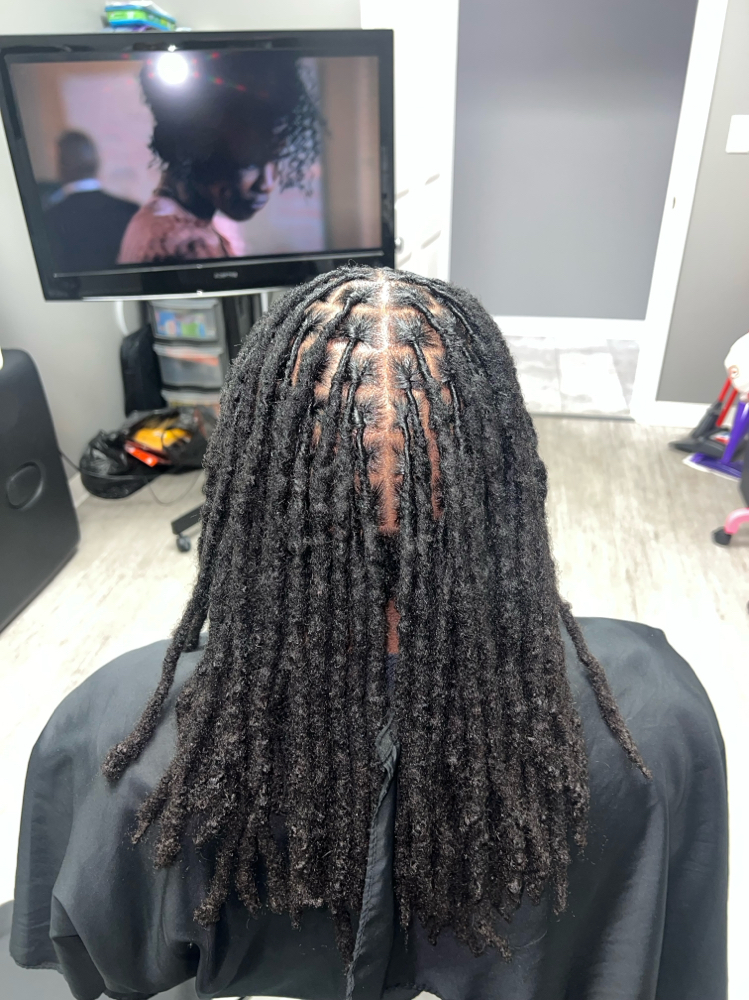 Loc Retwist at Silk & Slated Studio in Evansville, IN