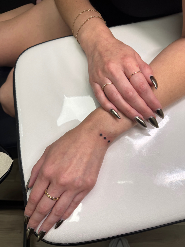 TINY TATTOO