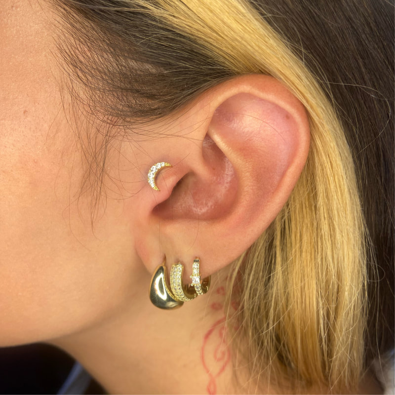 Tragus Piercing at Divine Image Ink Piercings in Parma Heights, OH