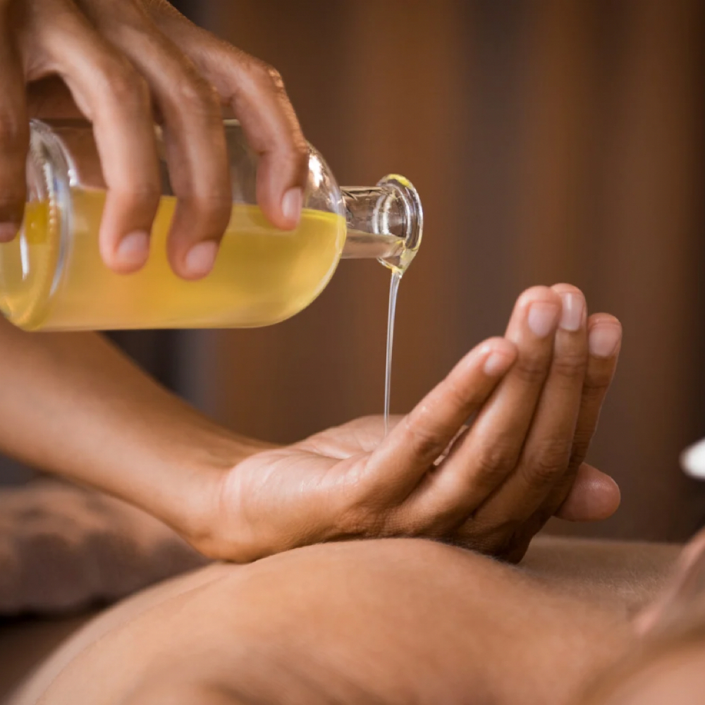Warm Body Oil Application at Stony Point Spa in Watertown, SD