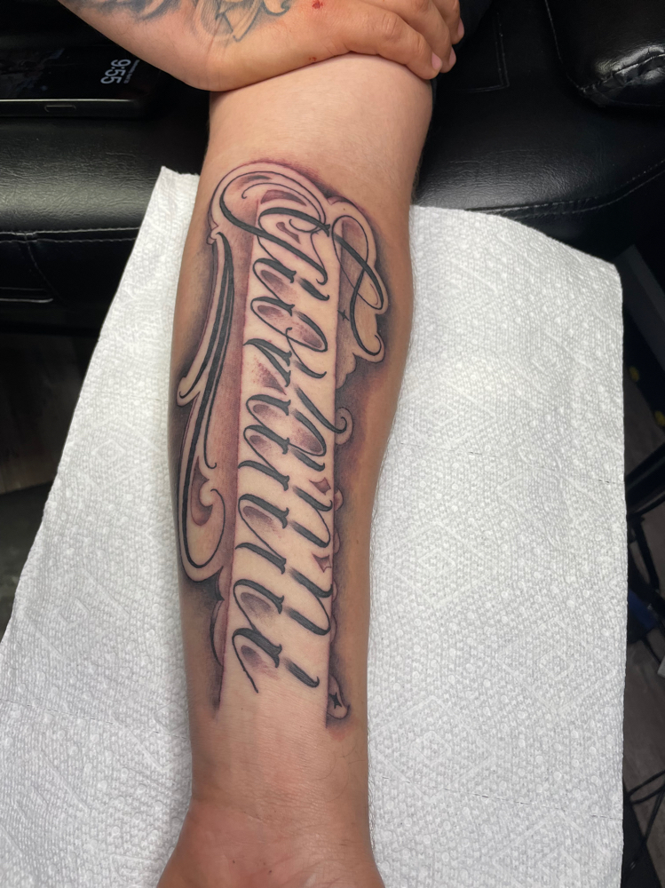 Large Lettering Tattoo