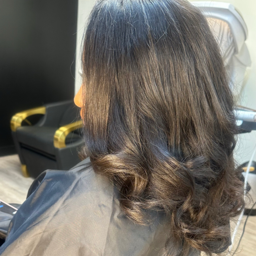 Sew-In Maintenance at Valentino Virgin Hair Salon Bar in Houston, TX