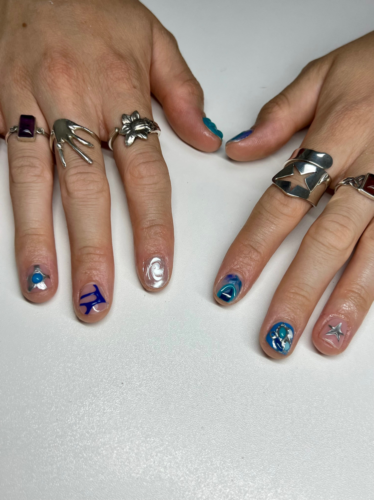 Builder gel overlay with designs at The Nail Muse in San Diego, CA