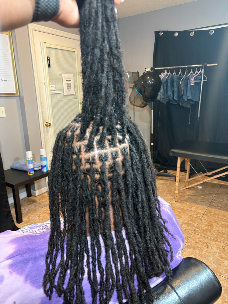 Interlock Retwist at Mochas Lux Locs in Hinesville, GA