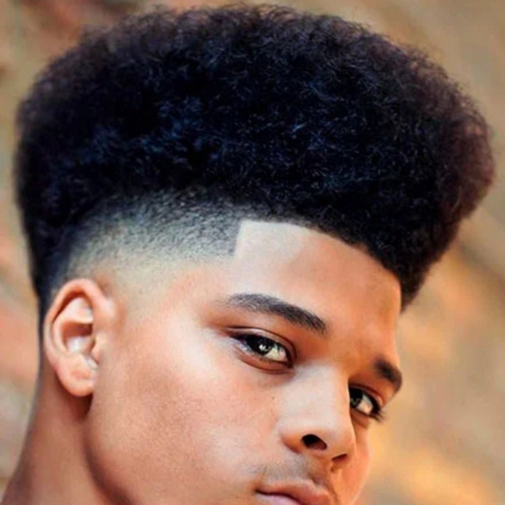Hightop Fade at Man Cave Retreat Barbershop in Fort Myers, FL