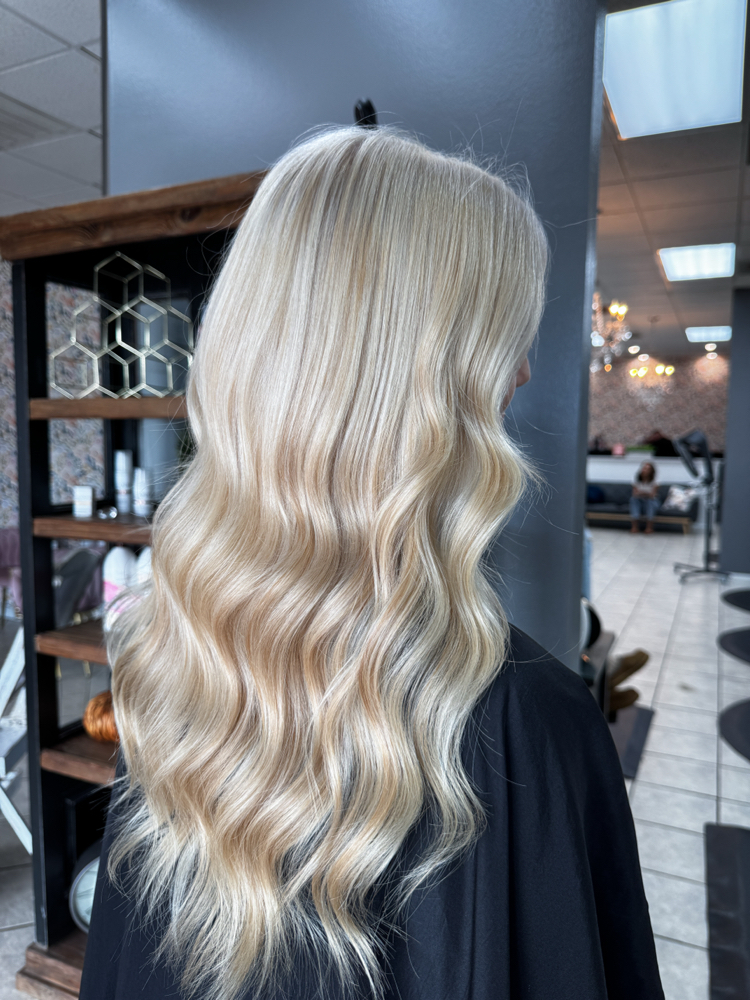 Bleach Touch Up at Jayden.K.Hair in Pace, FL