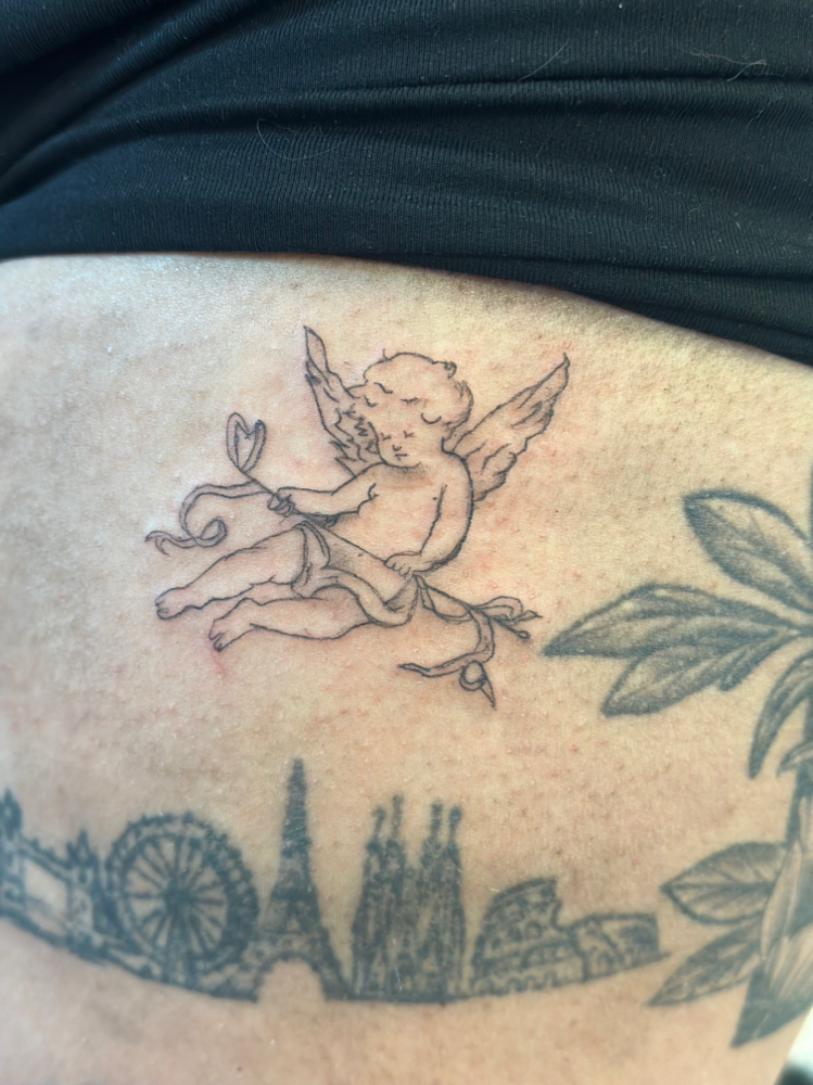 Fine Line Tattoo