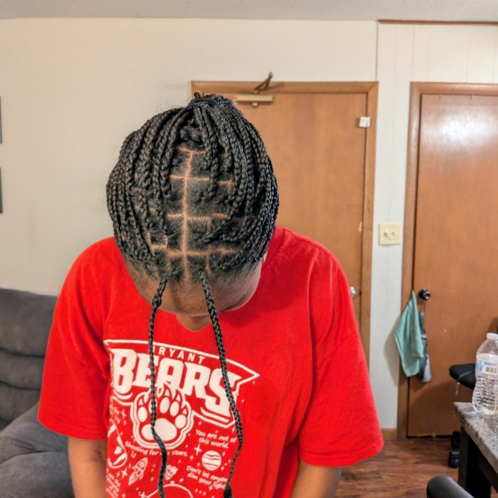 Small Knotless box braids at Smiles & Styles in Sioux City, IA