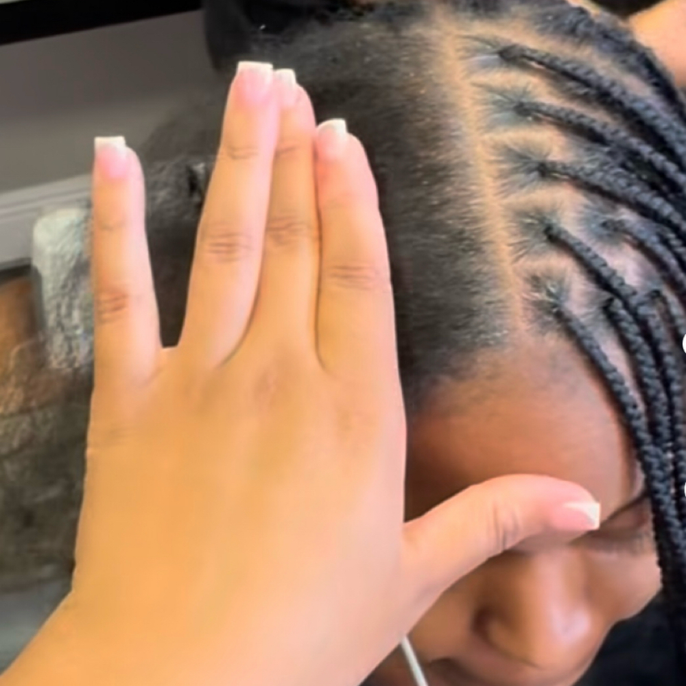 TOUCH UP 2 ROWS ALL AROUND at Afrokreyol luxury Braids, k Tips, weave & locs salon in Plantation, FL