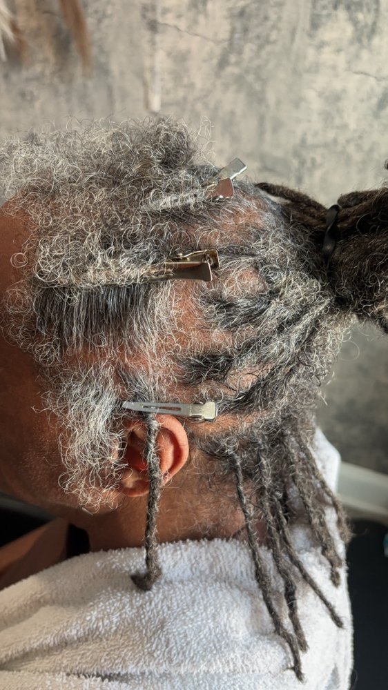 Instant Loc( Entire Head) at Dreaded Charm in Olive branch, MS