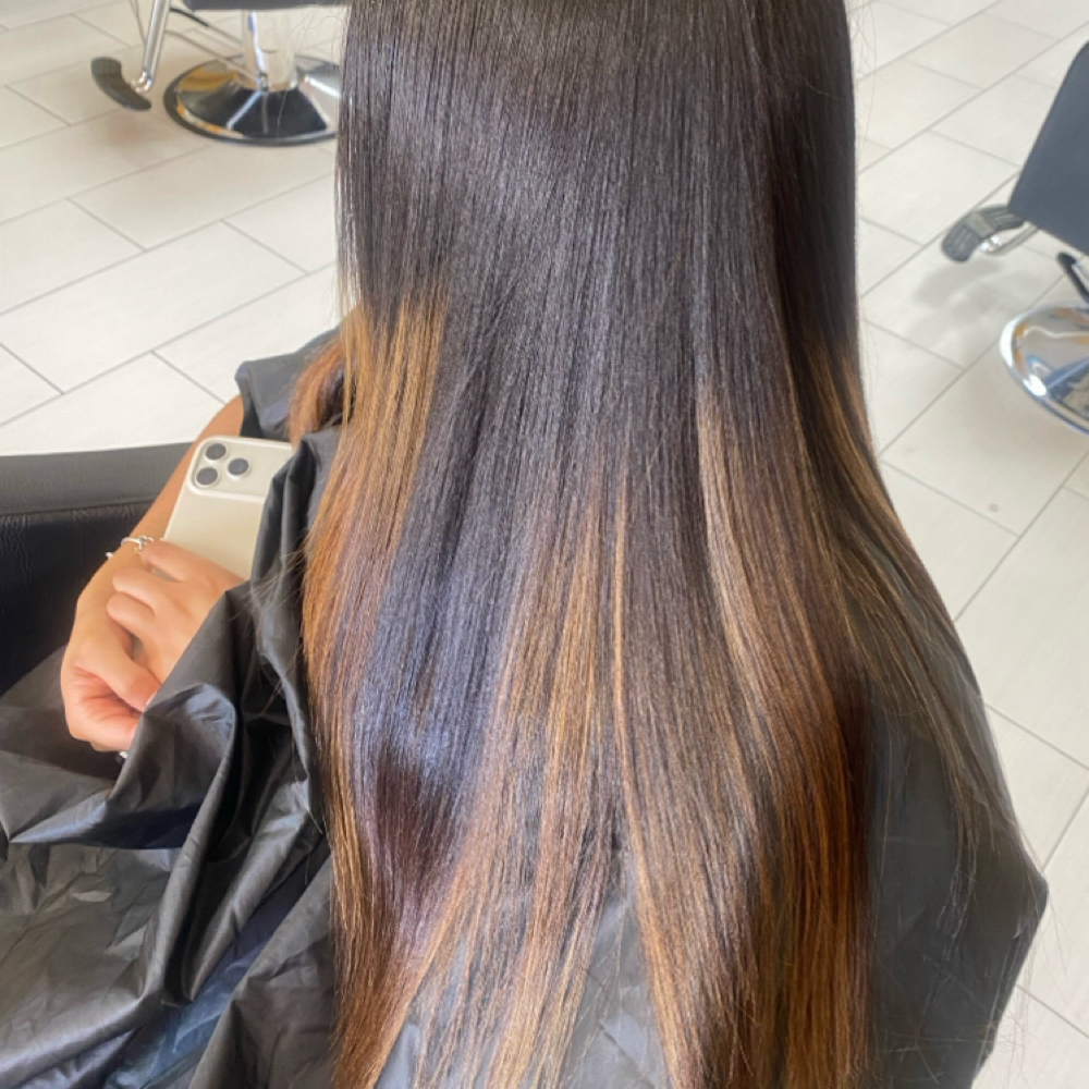 The Ulitmate Silkpress at HairbyMiracle in Ocala, FL