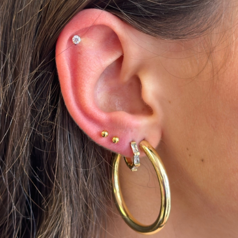 Three Ear Piercings