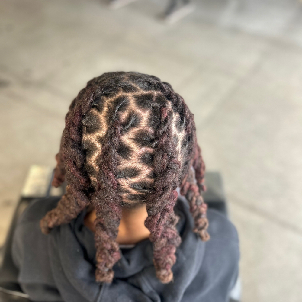 Dreadlock Retwist Full Head at KenzKuts in Eau Claire, WI