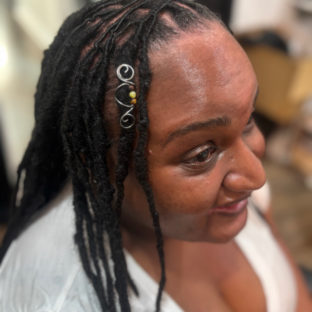 Small Jewelry Enhancement at SaMecia Blount Locs Hair in Durham, NC