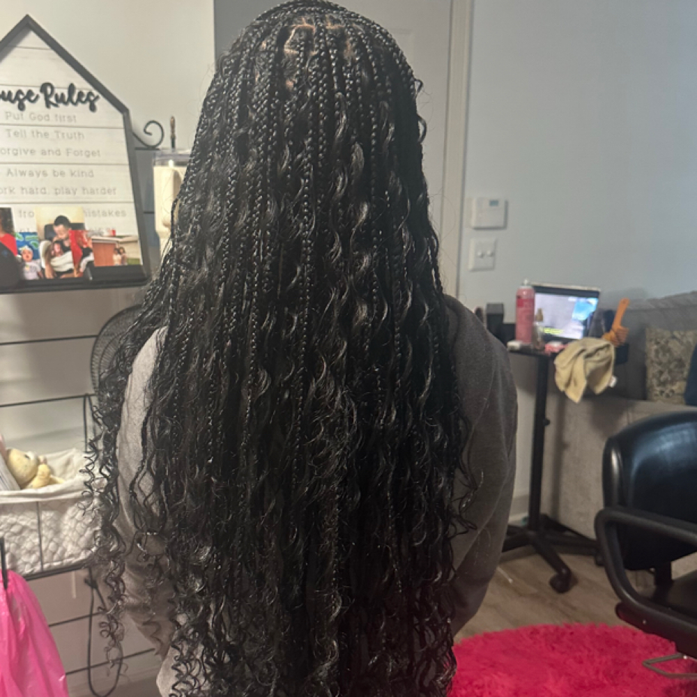 Smedium Boho Knotless Braids at braidedbyniya in fayetteville, NC