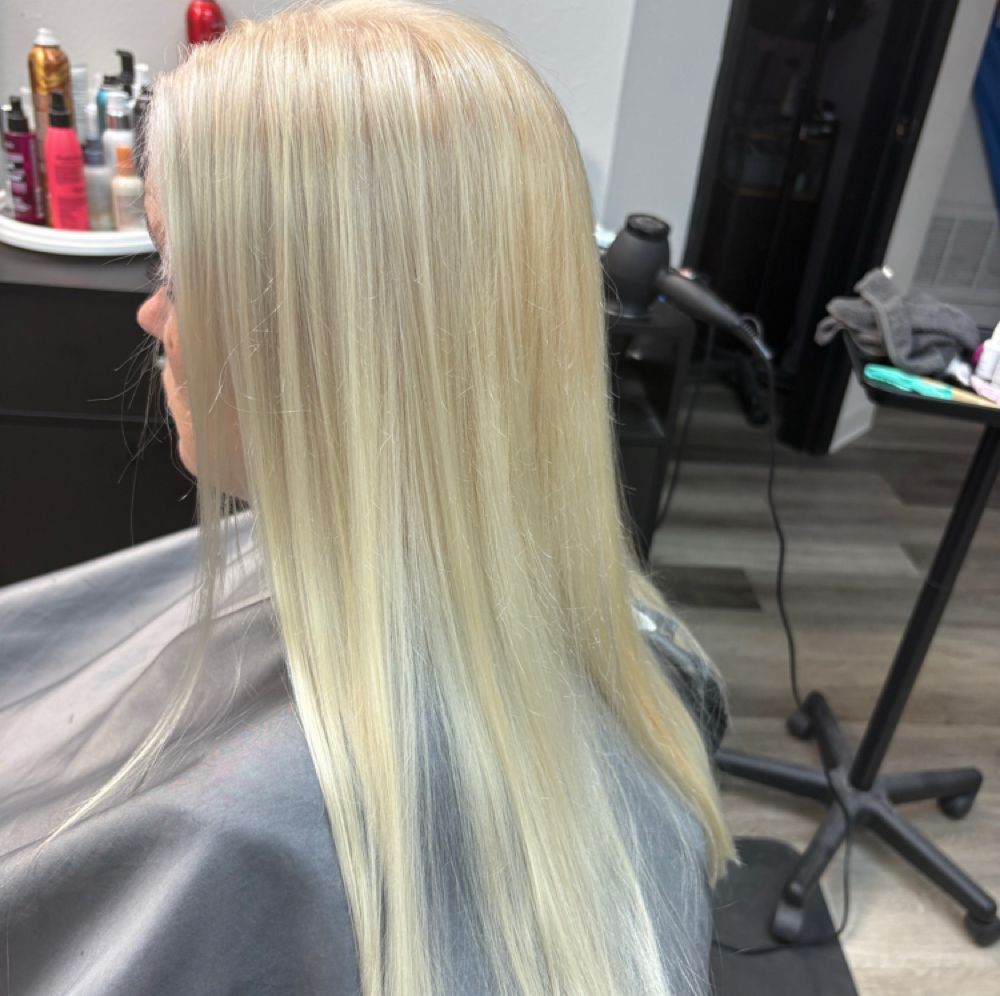 Bleach retouch/all over at Crowns Of Glory Hair Studio in Cleveland, TX