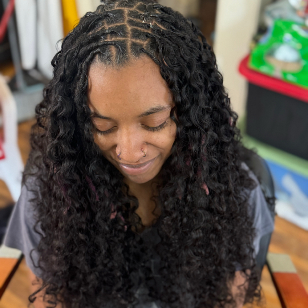 Miracle knots On locs at Bnatural Hair Studio in Richmond, VA