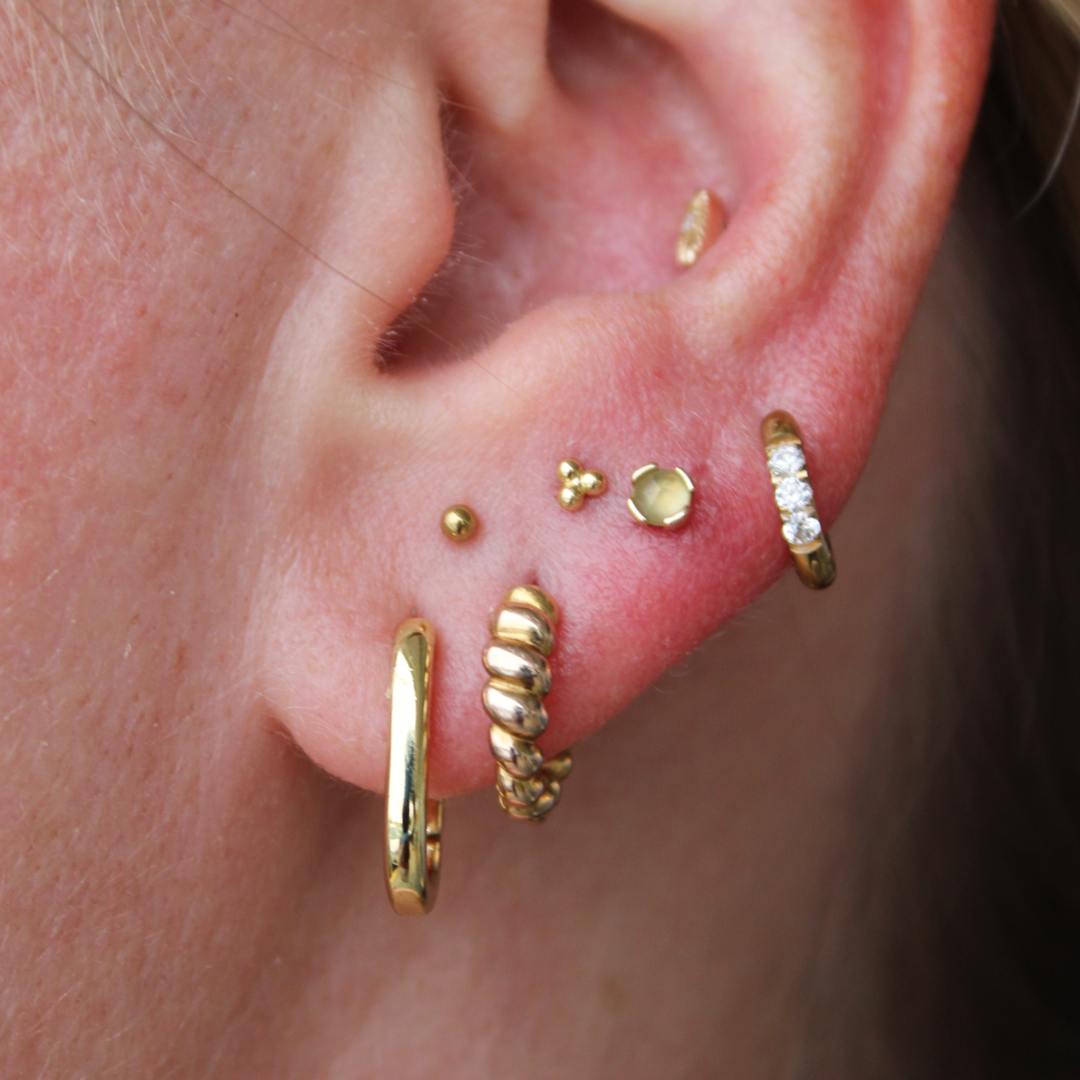 Pair/Multiple Lobe Piercings (6+) at Inferno Body Arts in Madison, WI