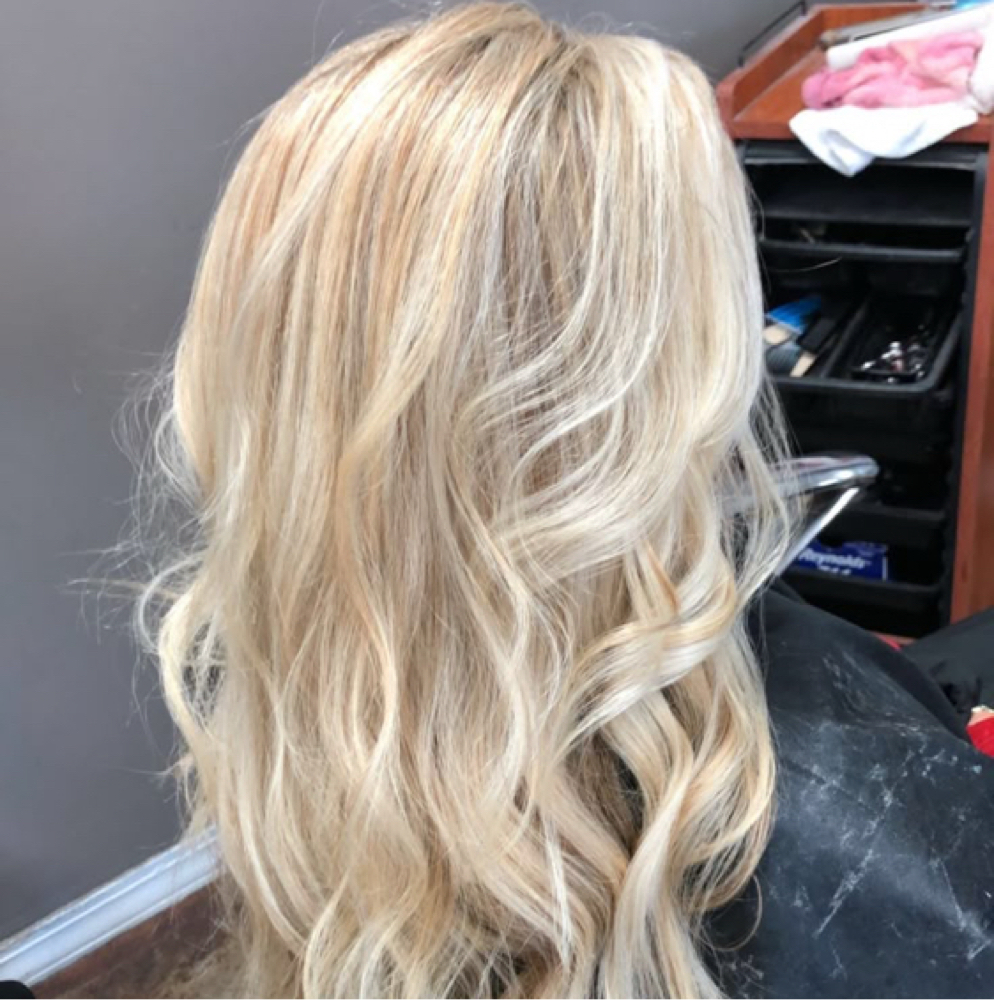 Platinum Blonde Transformation at Twin Peaks Hair Salon in Colorado Springs, CO