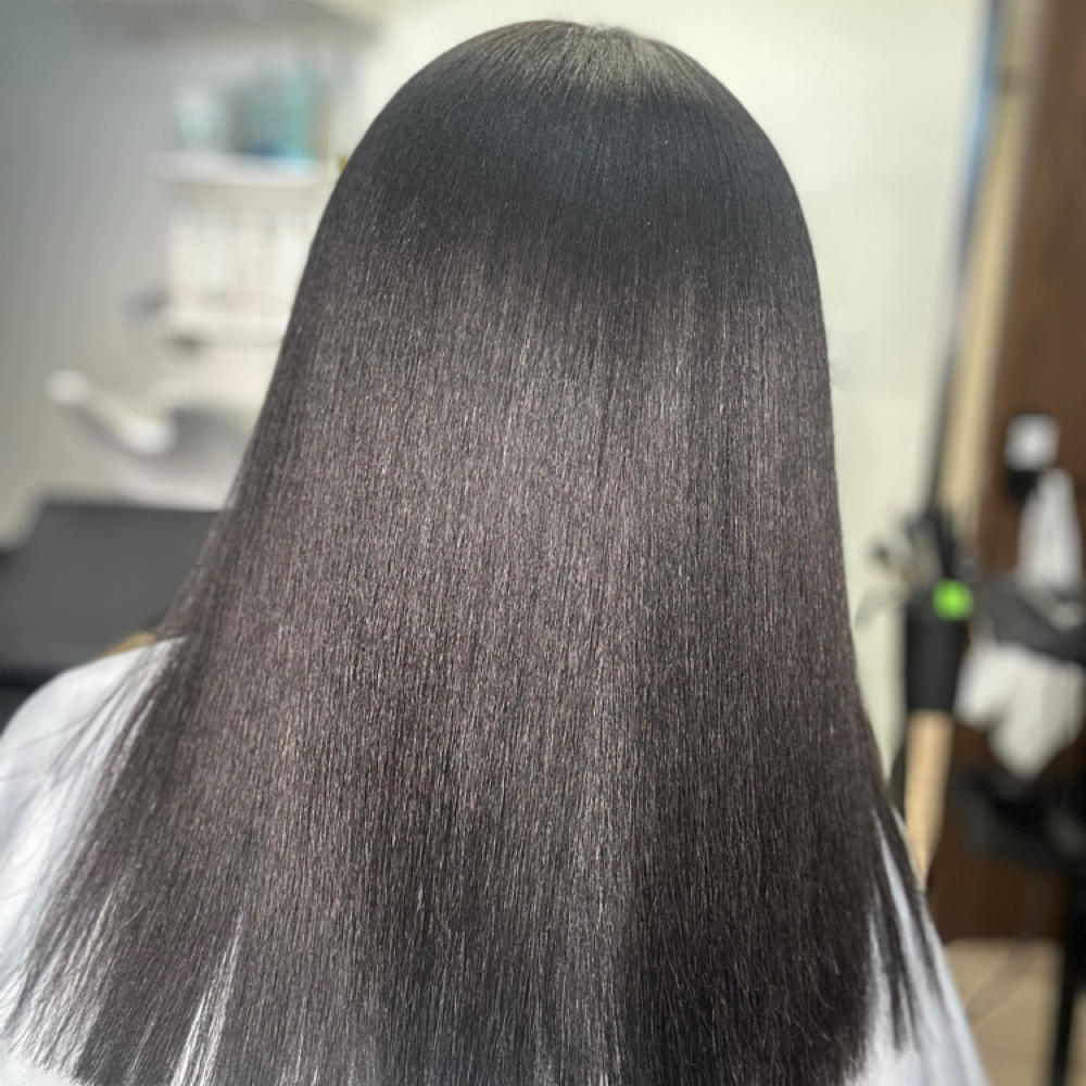 Silk Press and Deep Conditioner at Valentino Virgin Hair Salon Bar in Houston, TX
