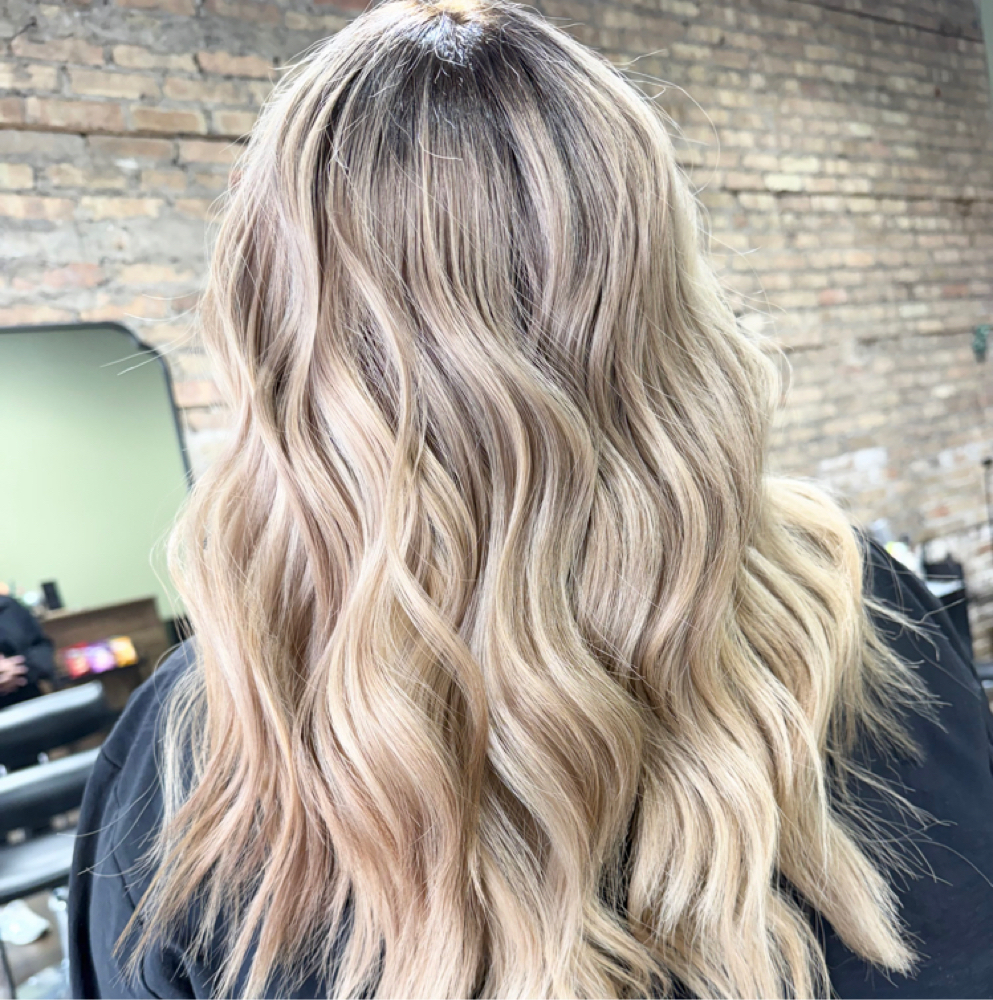 Full Blonding at Selena Rodriguez Hair in Whiting, IN