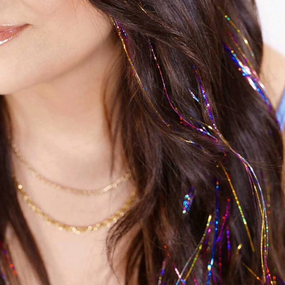 Tinsel Extensions at Hair By Brandi.b in Council Bluffs, IA