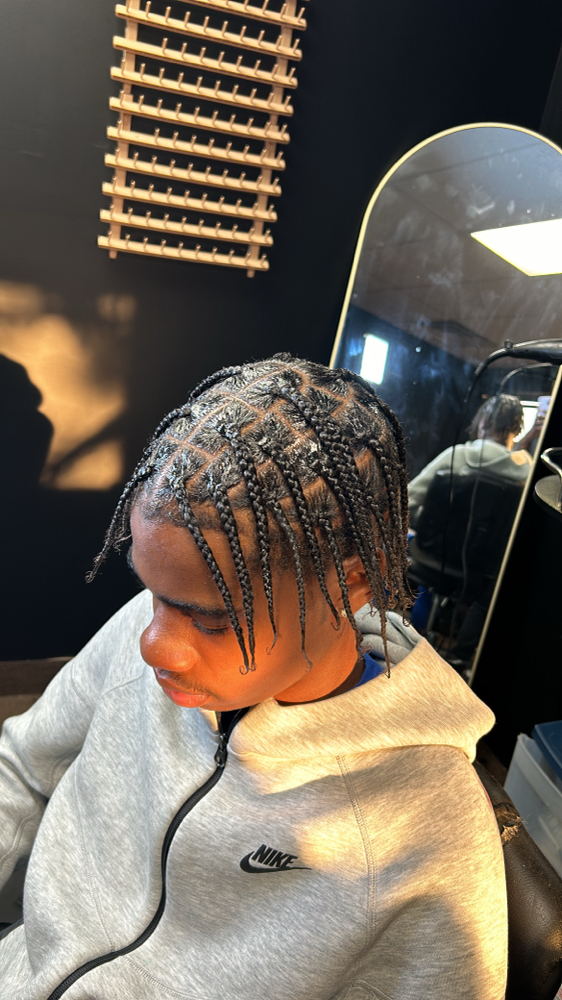 Men Single Braids Medium at Grippedbymir in Eastpointe, MI