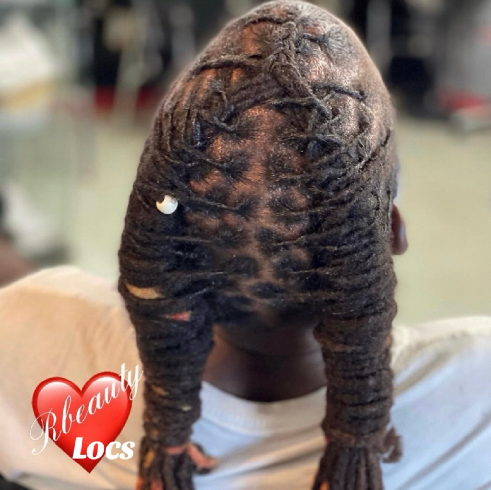 Retwist Style Two-Barrel Twist at Renees Beauty Salon in Texas City, TX