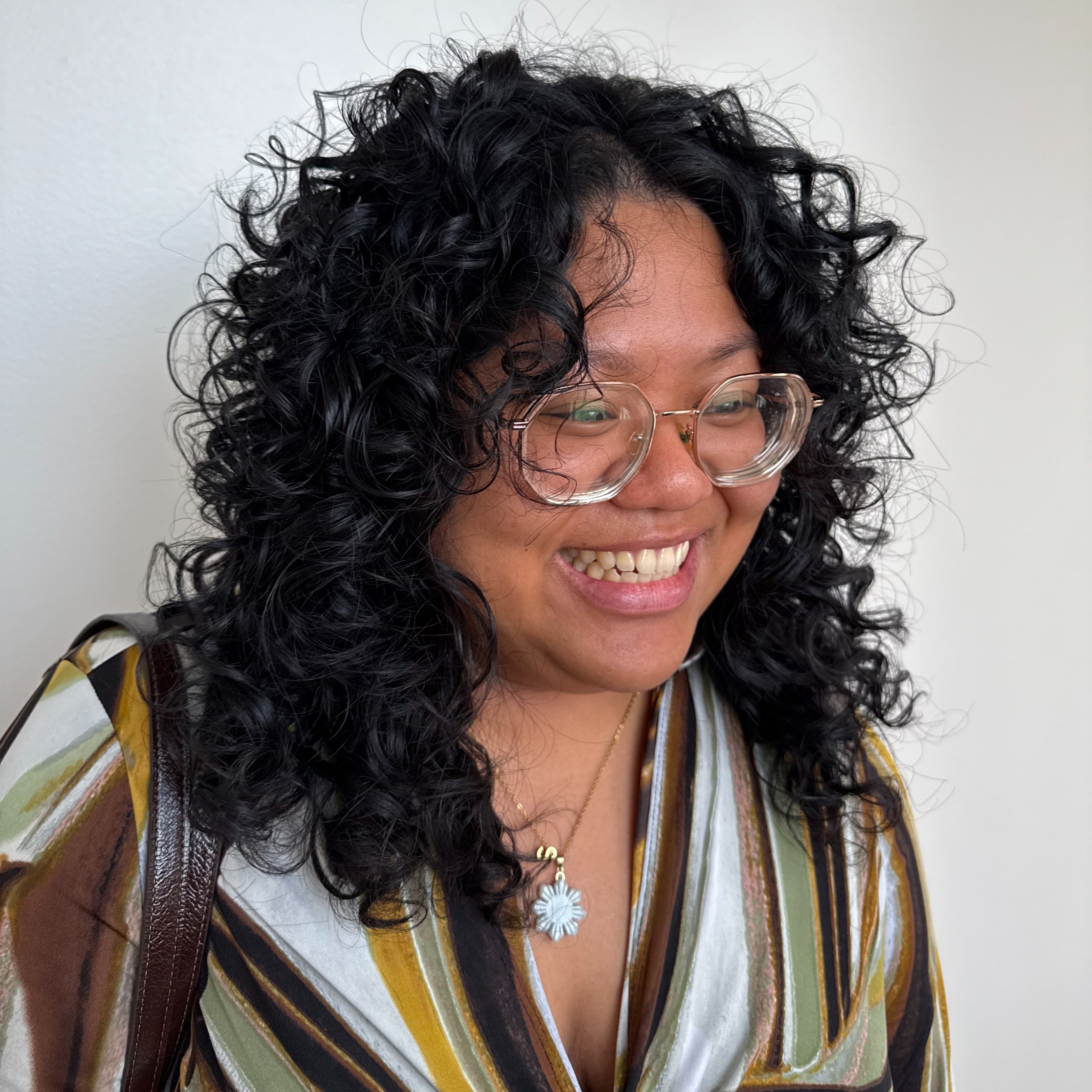 THE MID LENGTH CURLY CUT